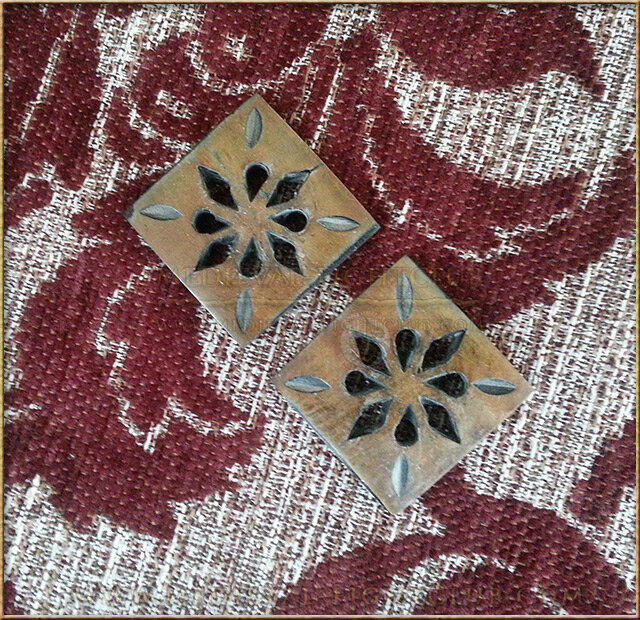 Square hand made horn button with floral pattern