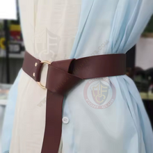 leather belt on white shirt